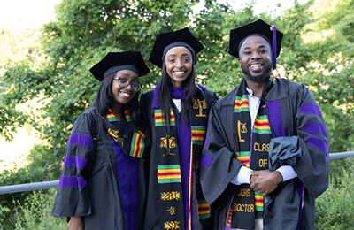 Three graduates