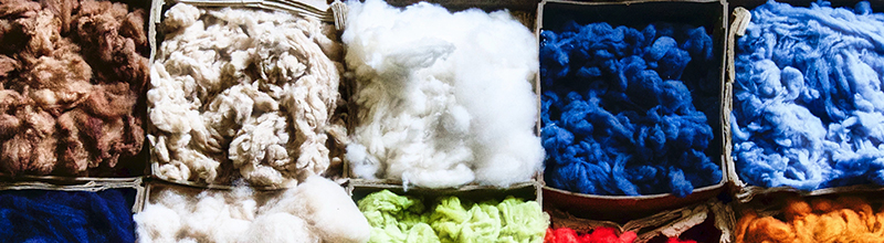 boxes of colored wool