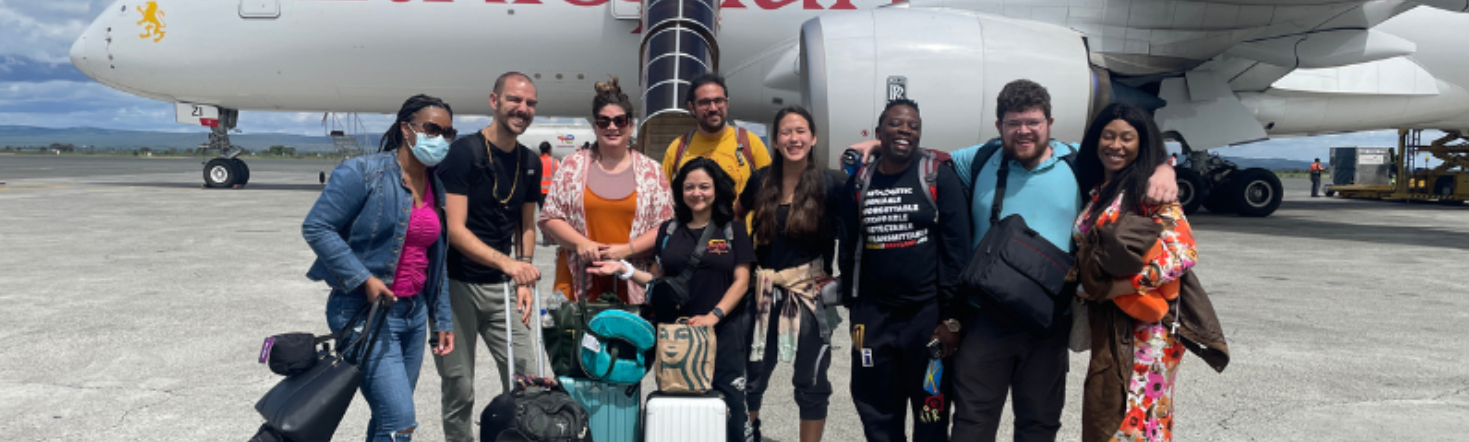 Students in front of a plane