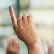 Raised hands in a classroom