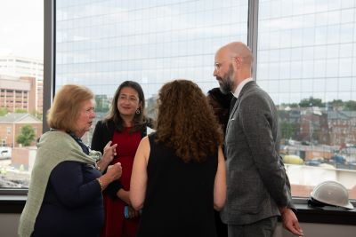 Jane Shaab (left) discusses the history of the BioPark and the construction of 4MLK with members of the EDA delegation, including Amanda Kostry (center) and Eric Smith (right).