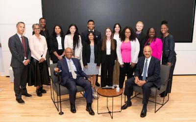 Seated L-R: Professor Larry Gibson and former Attorney General Eric Holder. Back Row L-R: Professor Michael Pinard; Dean Renée Hutchins Laurent; Monique Dixon, director Gibson-Banks Center; second from right, Professor Sherrilyn Ifill, Howard Law School, with Maryland Carey Law students.