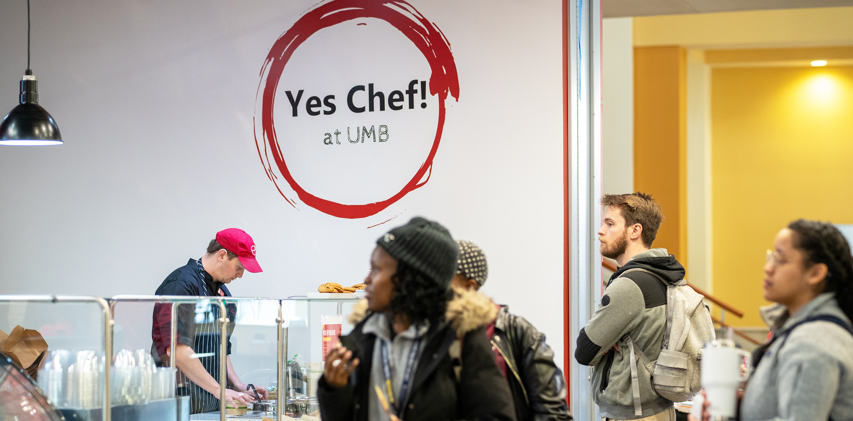 Students inside Yes Chef at UMB